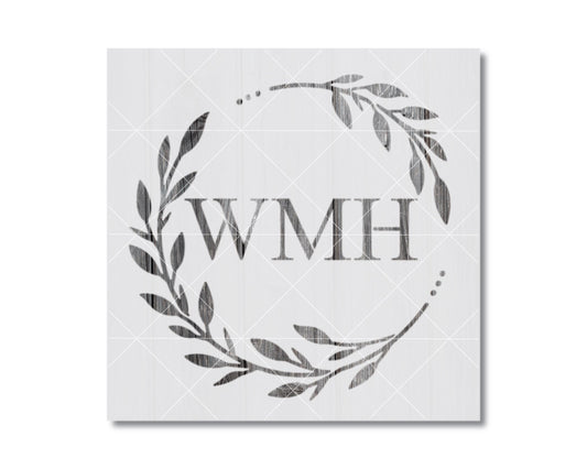 a wreath-like design with the letters "WMH" prominently displayed in the center.
