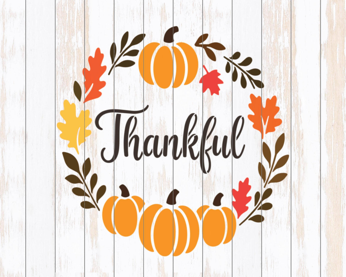 A wreath made of autumn leaves, pumpkins, and the word "Thankful" in a stylized font.