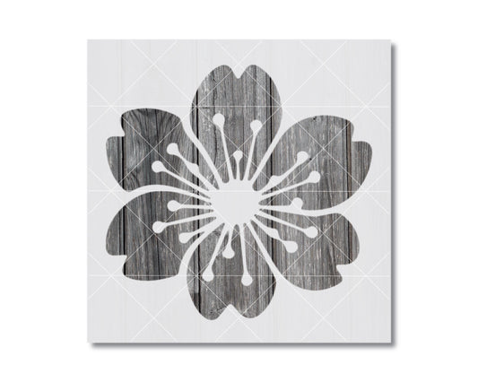 A black and white image depicting a stylized flower design with a wooden texture.