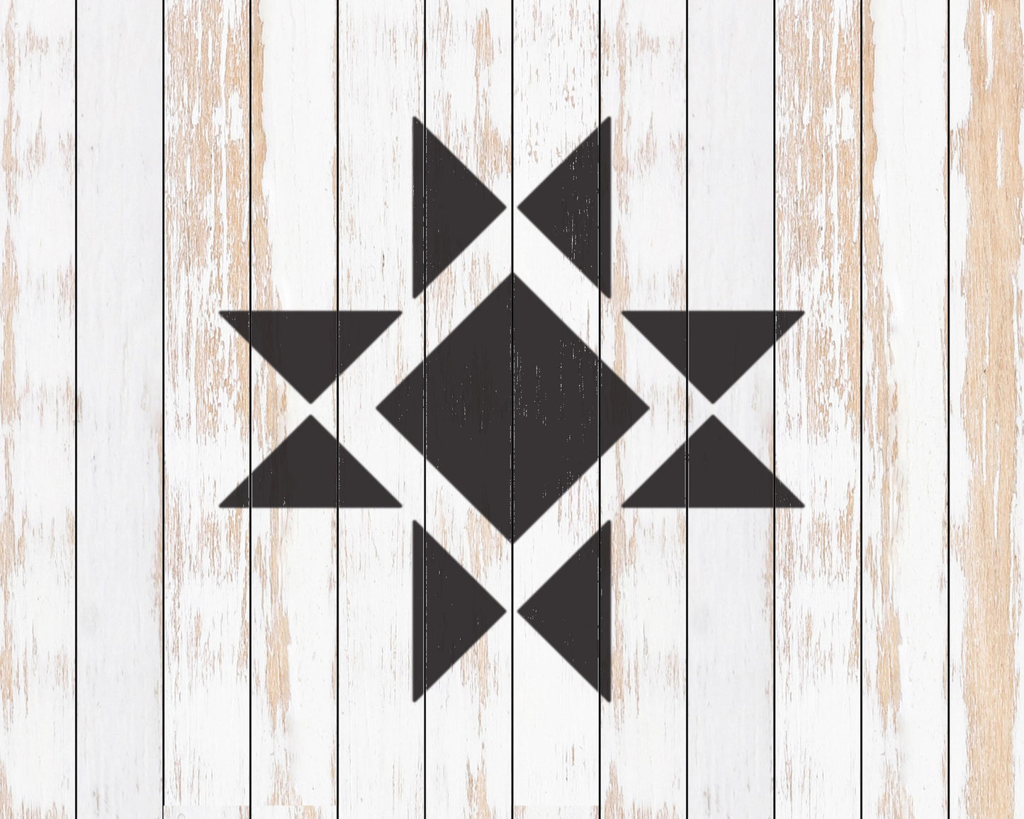 a black and white geometric design composed of various triangular shapes arranged in a central pattern.