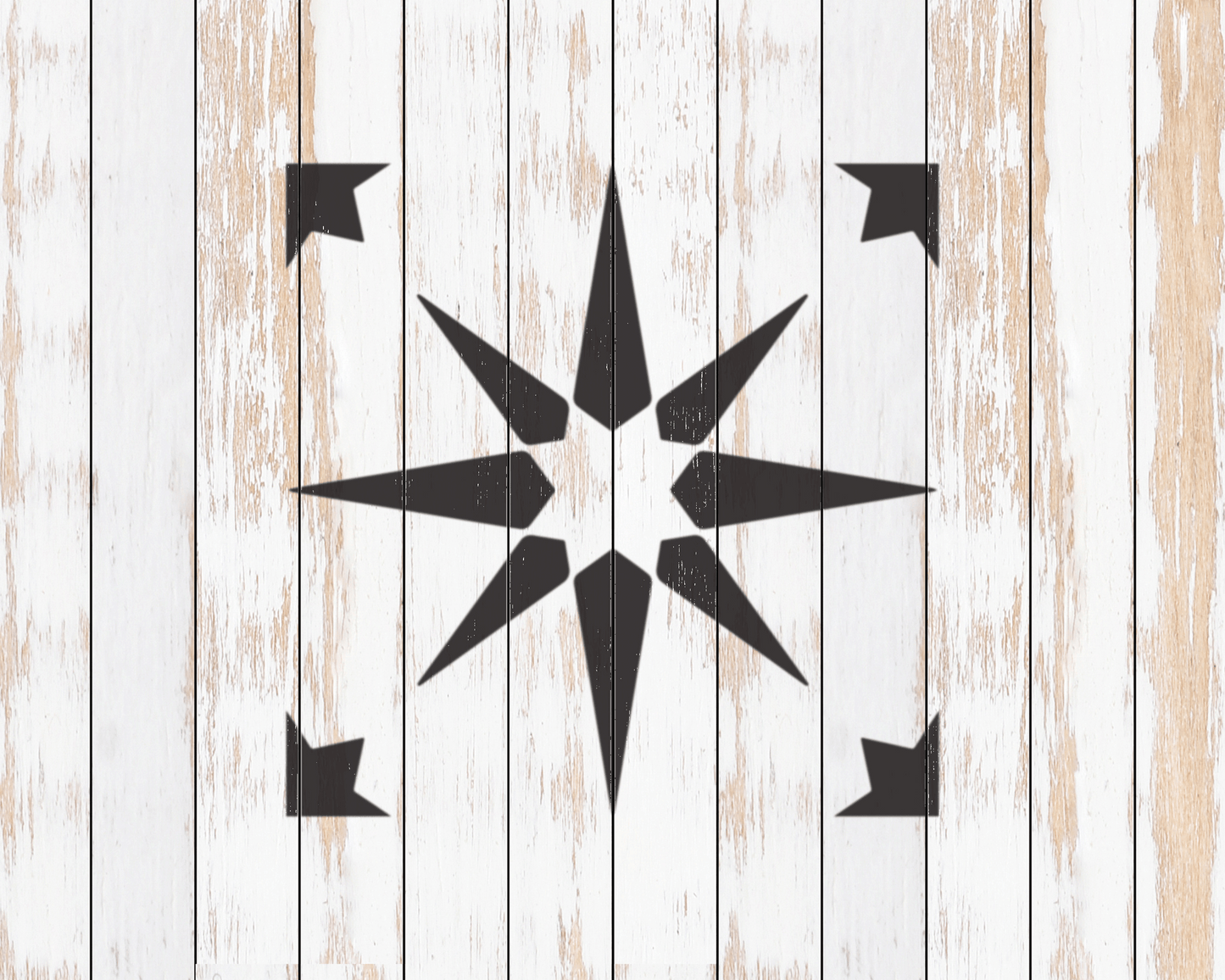 a white wooden background with a black star design in the center.