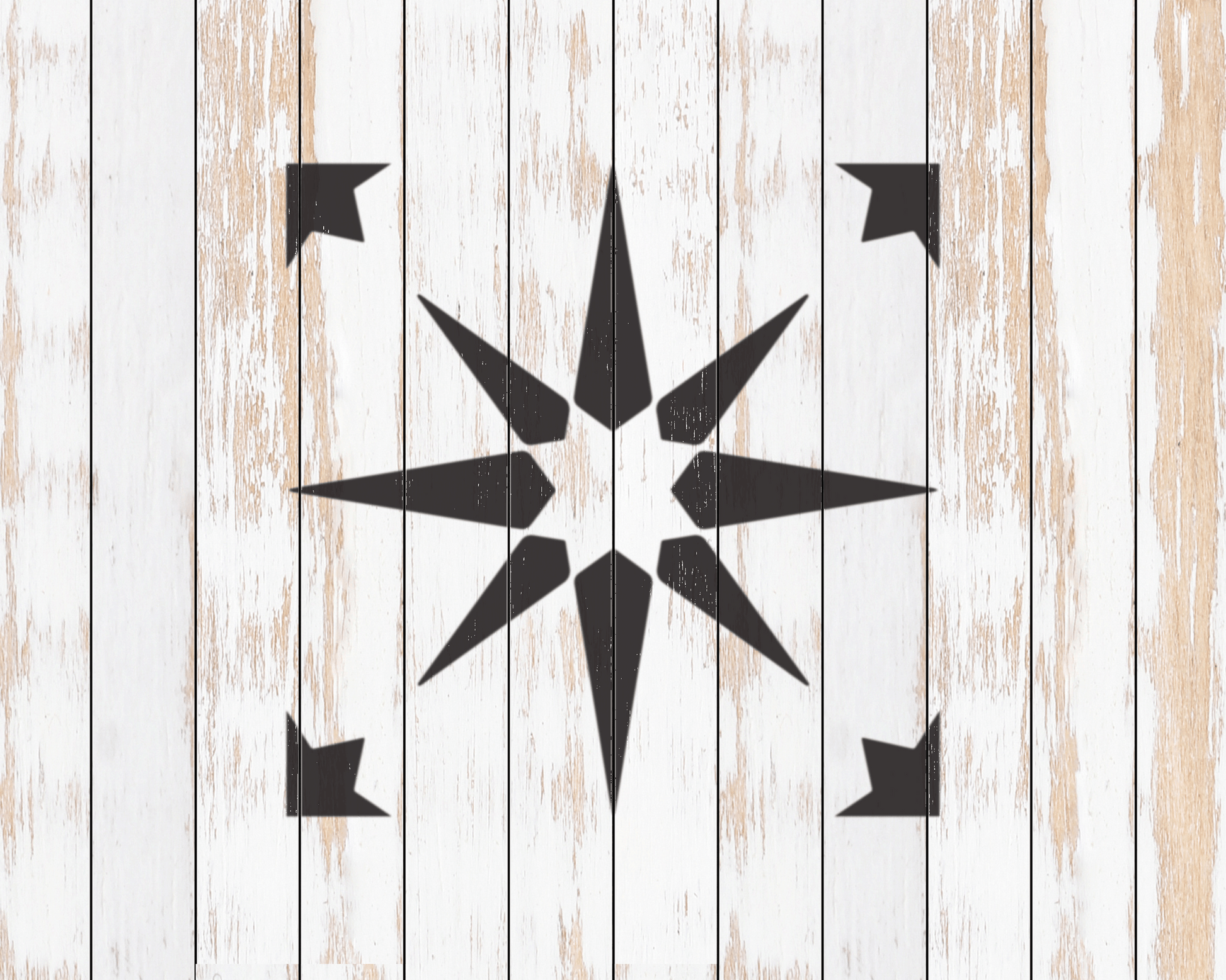 a white wooden background with a black star design in the center.