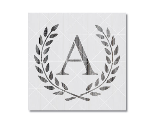 a monogrammed letter "A" with a laurel wreath design, which is a stylized symbol often associated with victory, honor, and achievement.