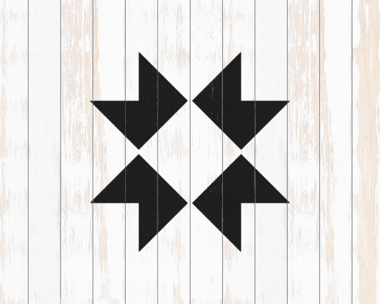 a simple, geometric design consisting of four black arrows pointing in different directions, set against a white wooden background.