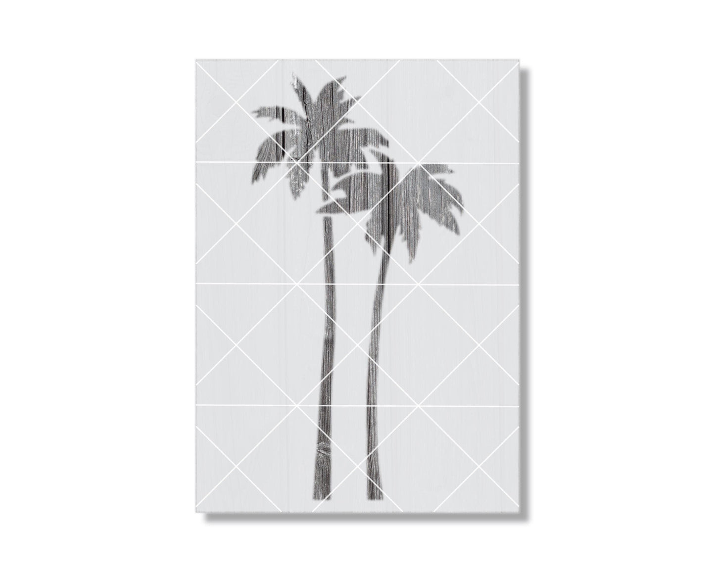 A black and white image of two palm trees with textured, weathered appearance.