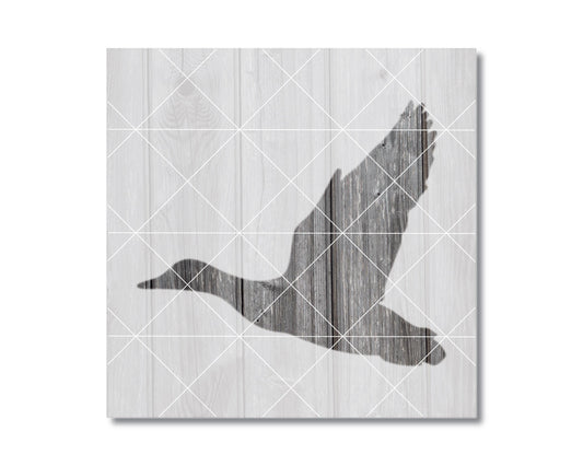 A silhouette of a bird in flight is depicted against a wooden background with a diamond pattern.