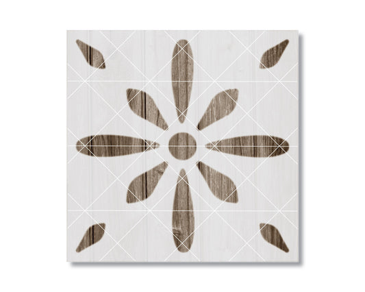 a square tile with a floral pattern, consisting of a central circle surrounded by eight petals arranged in a symmetrical design.