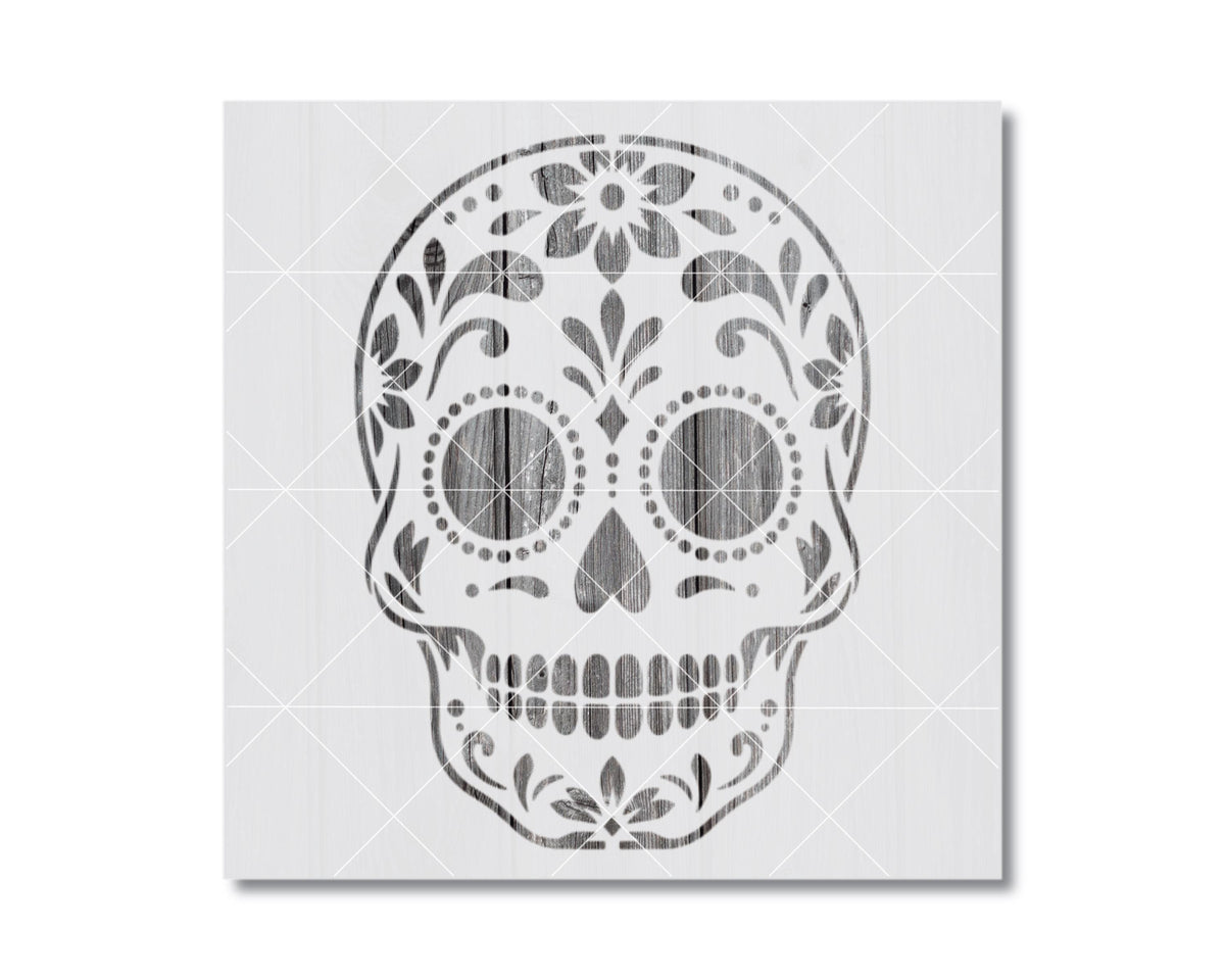 A stylized black and white illustration of a skull with intricate floral and geometric patterns decorating the top.