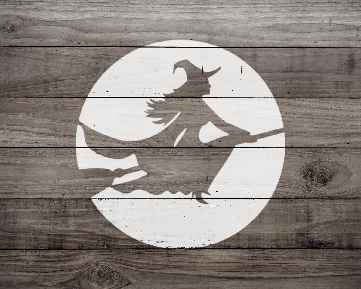 A silhouette of a witch riding a broomstick against a white circular background.