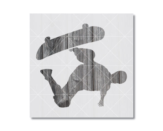 A silhouette of a person performing a skateboard trick against a white background.
