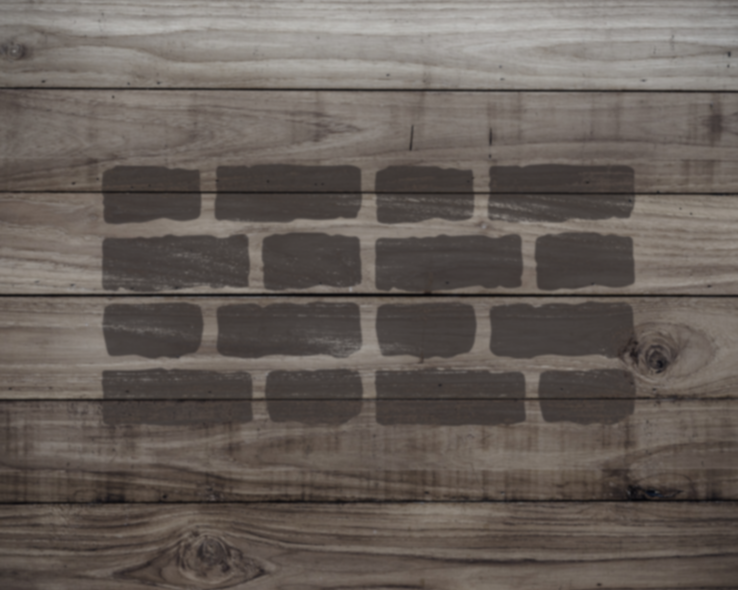 a wooden surface with a pattern of dark gray bricks or blocks arranged in a repeating pattern.