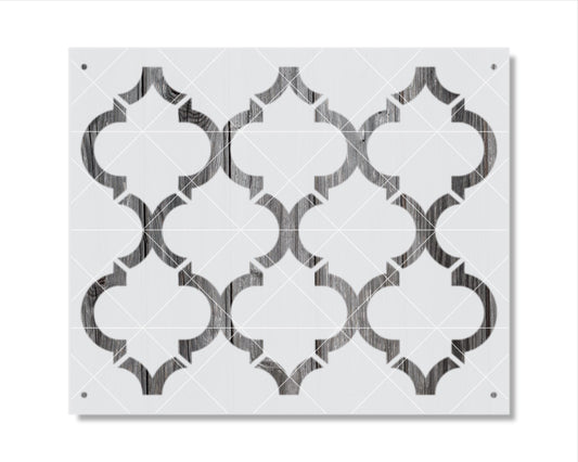 a repeating pattern of black and white geometric shapes, creating a visually striking and symmetrical design.