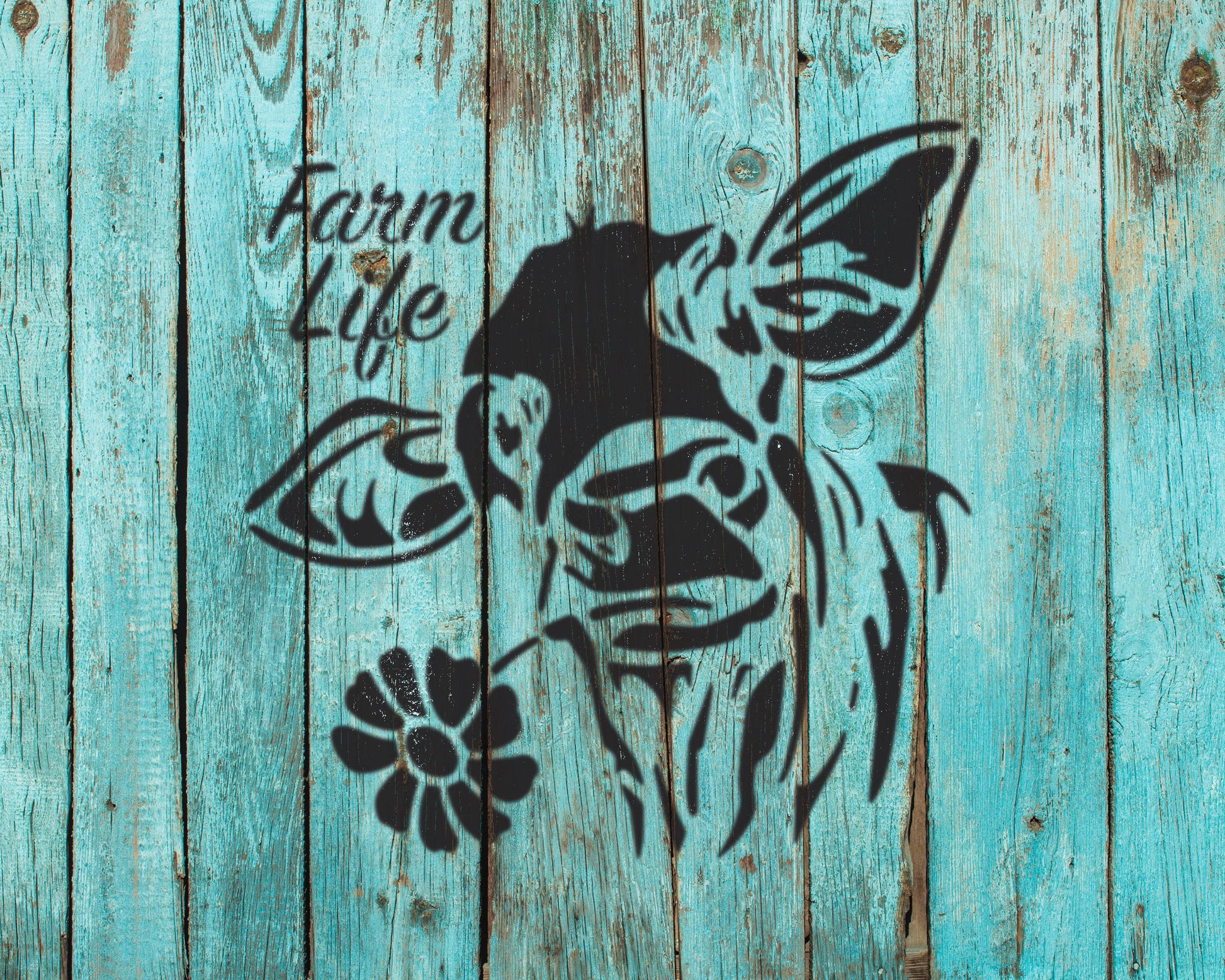 a black silhouette of a cow's head with a flower in its mouth, set against a blue wooden background.