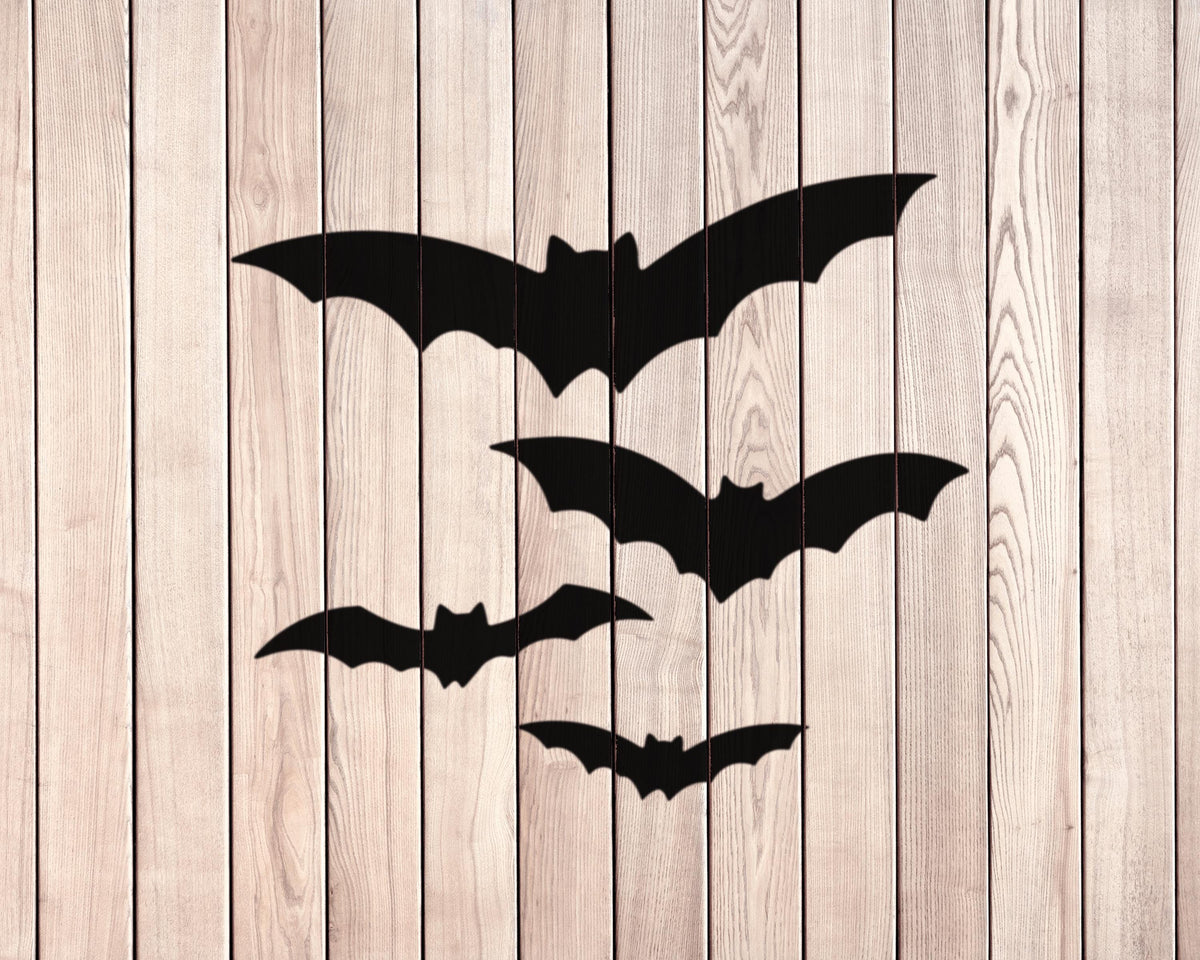 silhouettes of bats against a wooden background.