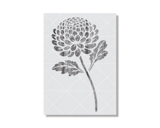 A black and white image depicting a stylized chrysanthemum flower.
