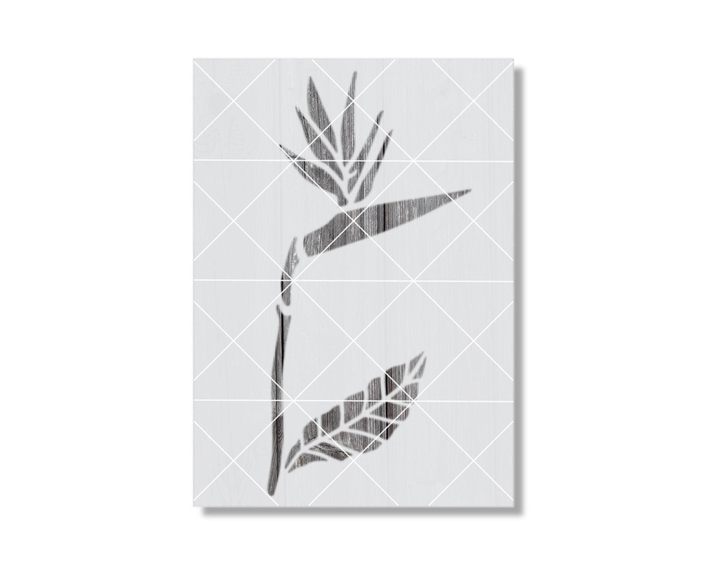 A black and white image depicting a stylized flower or plant with a geometric pattern.