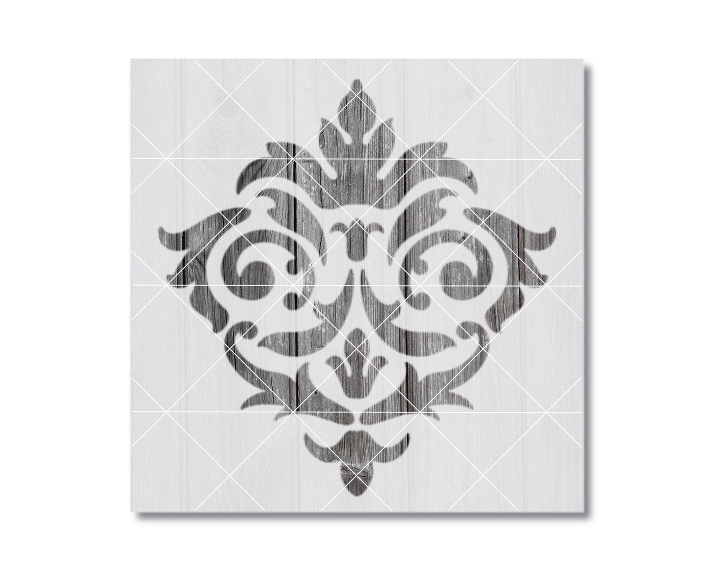 a decorative pattern with a symmetrical design, including a central motif surrounded by smaller, repeating elements.