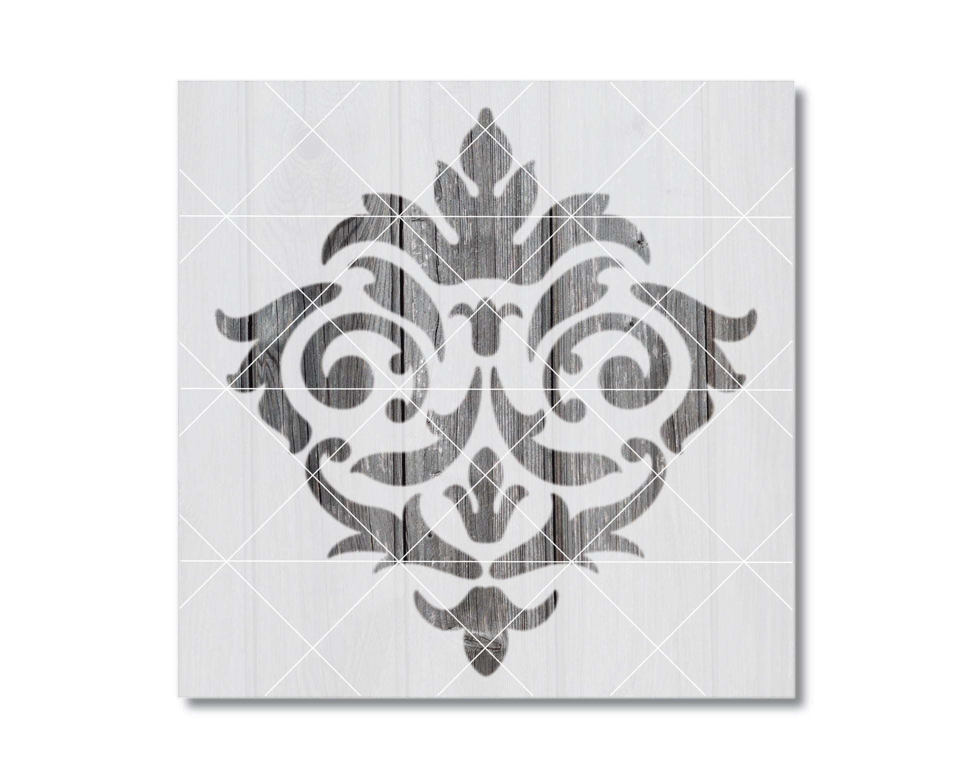 a decorative pattern with a symmetrical design, including a central motif surrounded by smaller, repeating elements.