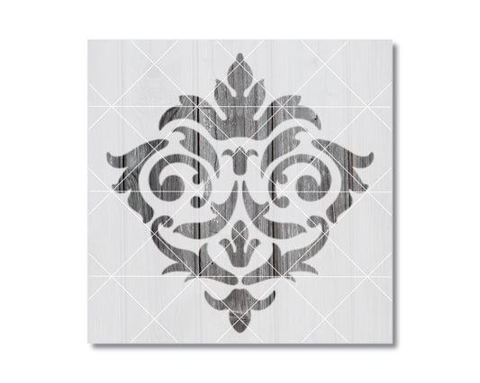 a decorative pattern with a symmetrical design, including a central motif surrounded by smaller, repeating elements.