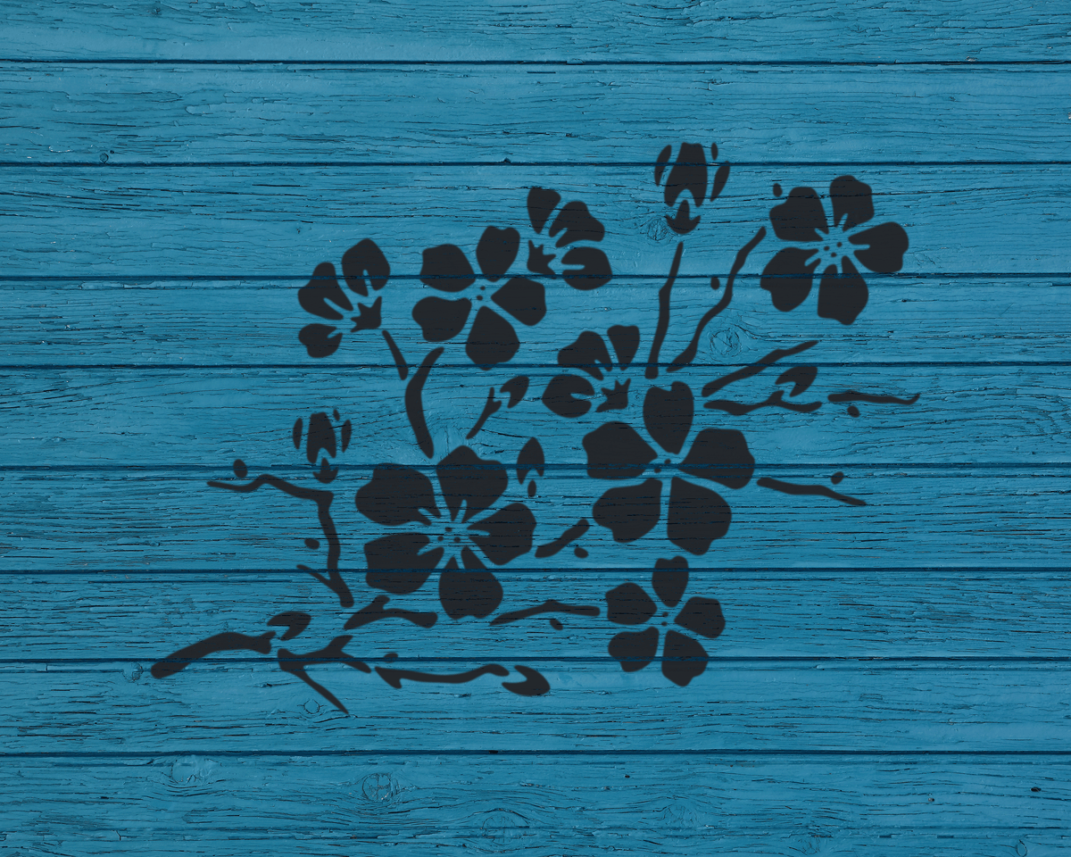 a blue wooden surface with a black silhouette of flowers or branches.