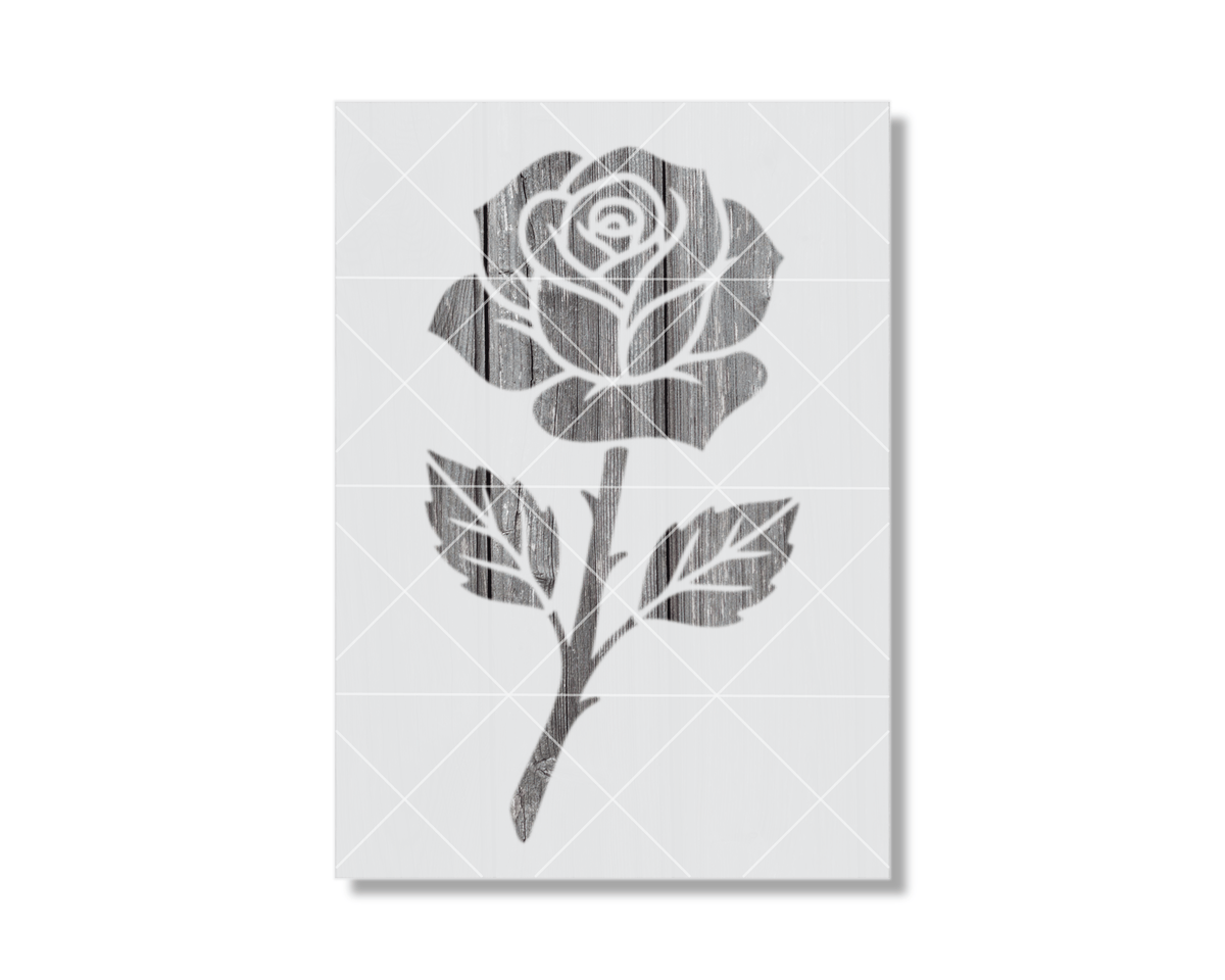 A black and white image of a rose with a textured appearance.