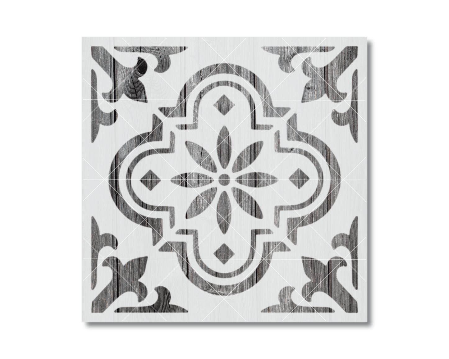 a square tile with a decorative pattern in black and white.