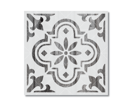 a square tile with a decorative pattern in black and white.