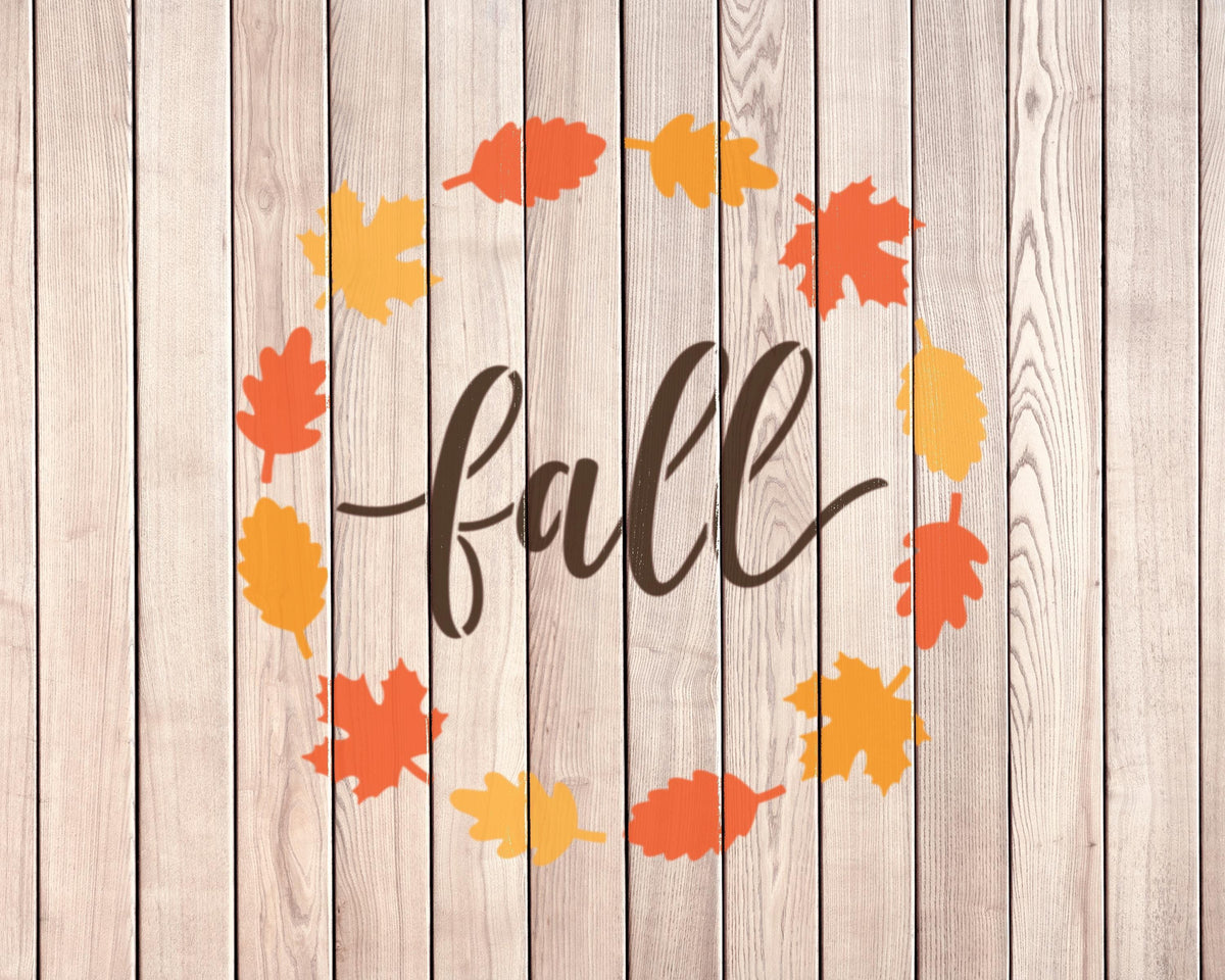a wreath of autumn leaves surrounding the word "fall" in a stylized font.