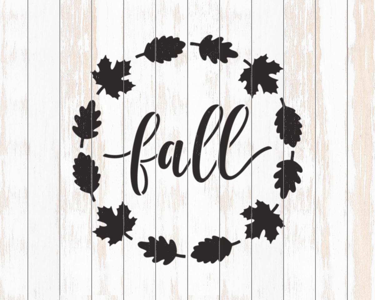 a wreath of black leaves surrounding the word "fall" in a stylized font.