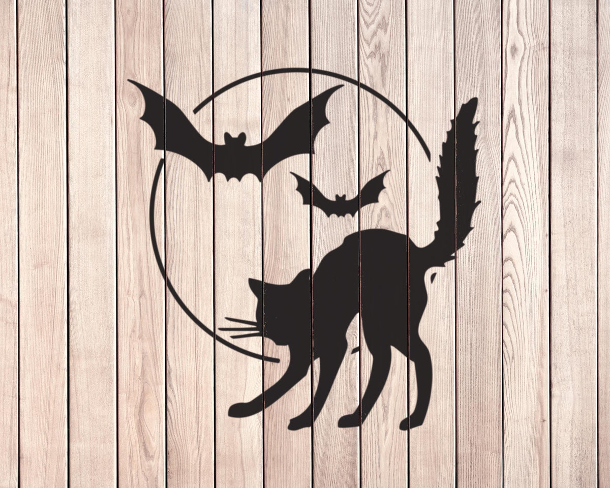 A black silhouette of a cat and two bats are depicted against a wooden background.