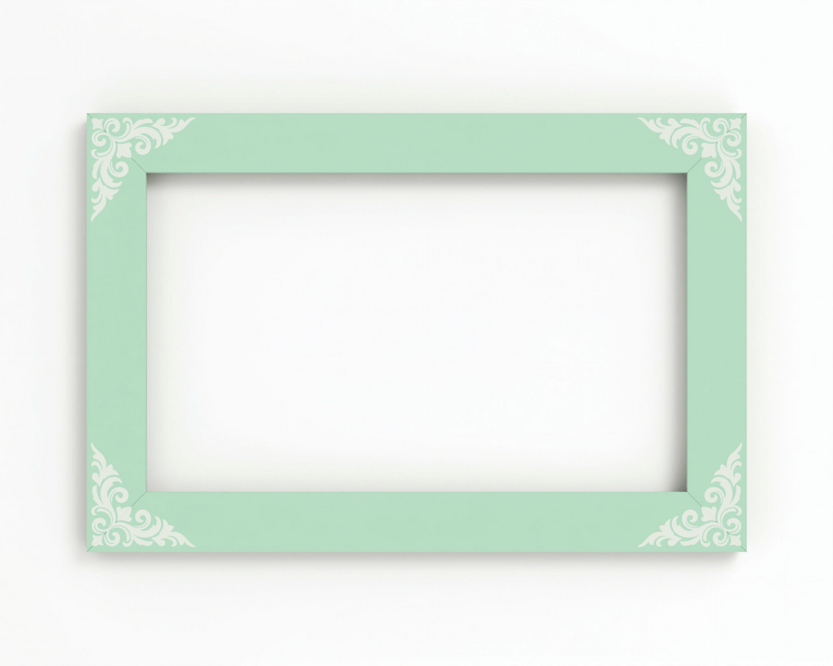 A light green picture frame with a decorative border on the corners.