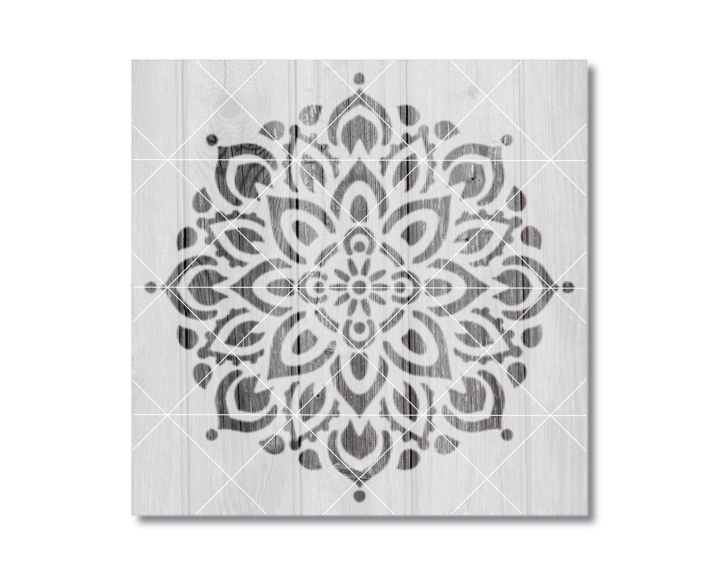 a symmetrical, intricate mandala-like design with a repeating pattern of floral and leaf-like shapes in black and white.