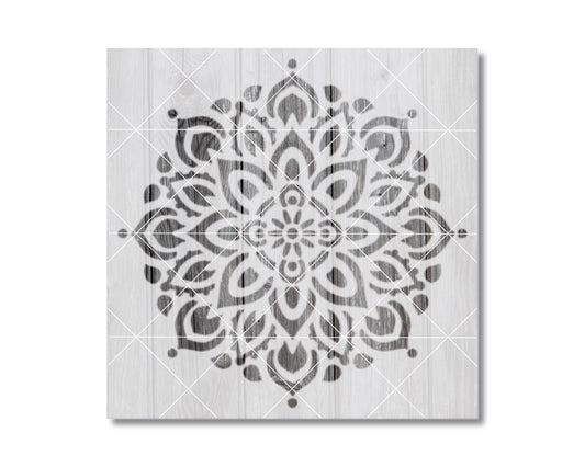 a symmetrical, intricate mandala-like design with a repeating pattern of floral and leaf-like shapes in black and white.