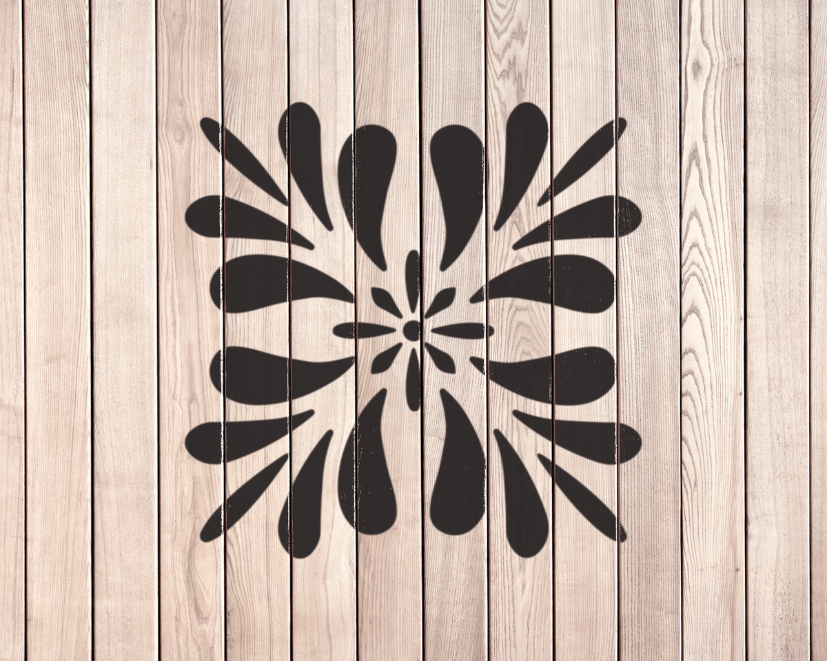 a wooden wall with a black and white design in the center.